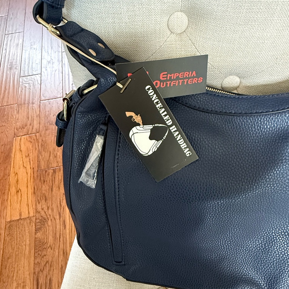 Blue Concealed Carry Shoulder Bag with Relaxed Style and Silver Hardware